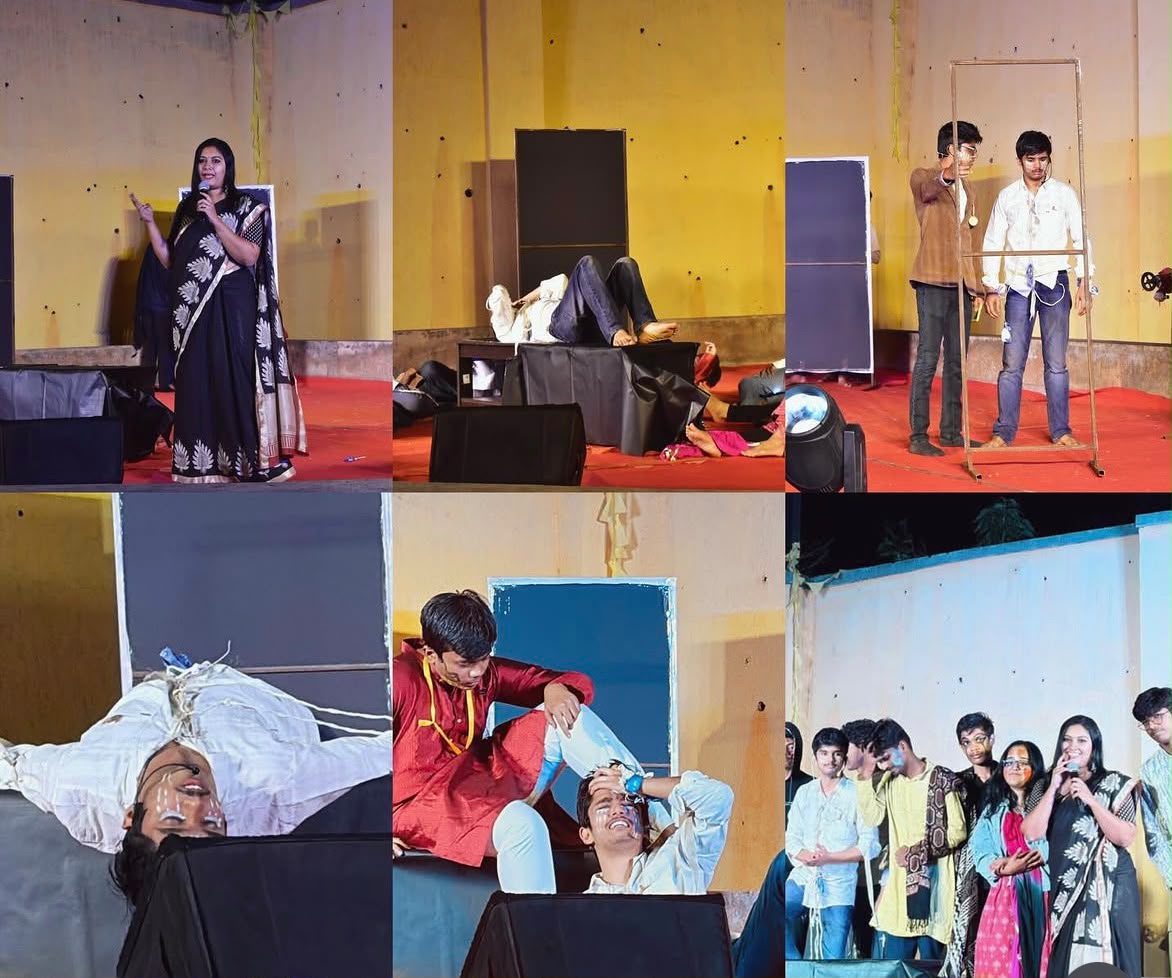 Students performing a devised piece on stage